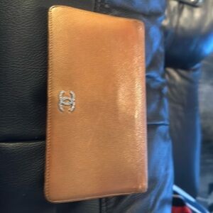 Chanel wallet in great condition 7card slots and 4 bill compartment.